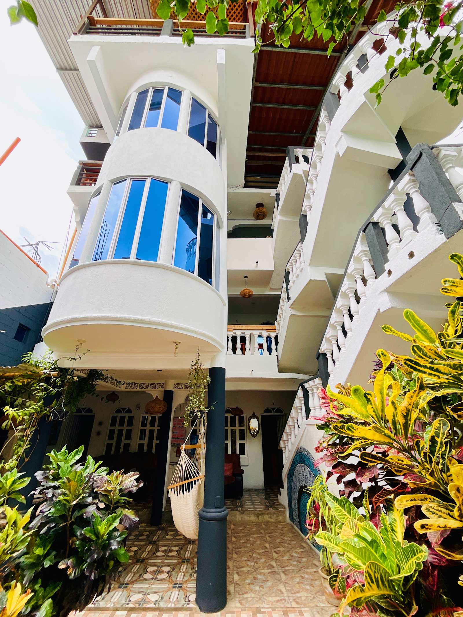 Mandalas courtyard with hammocks and white architecture